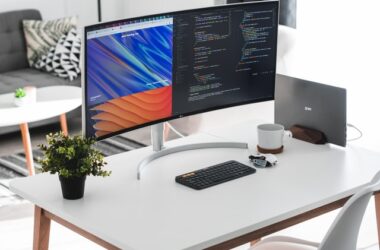 Aesthetic desk setup with vertically docked macbook