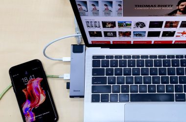 A MacBook and an iPhone Connected To a Baseus Docking station.