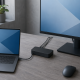 Unbranded Windows laptop connected to a docking station and one external monitor on a clean desk