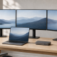 Laptop connected through one docking station to exactly three external monitors on a clean desk