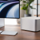 Mac mini connected to a high-resolution monitor on a clean desktop
