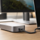 Thunderbolt 5 cables connected to a laptop and dock