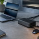 Illustrative desktop workstation with a generic fanless dock for the OWC Thunderbolt 5 Dock review.