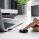 USB-C fingerprint reader connected to a laptop for Windows Hello sign-in