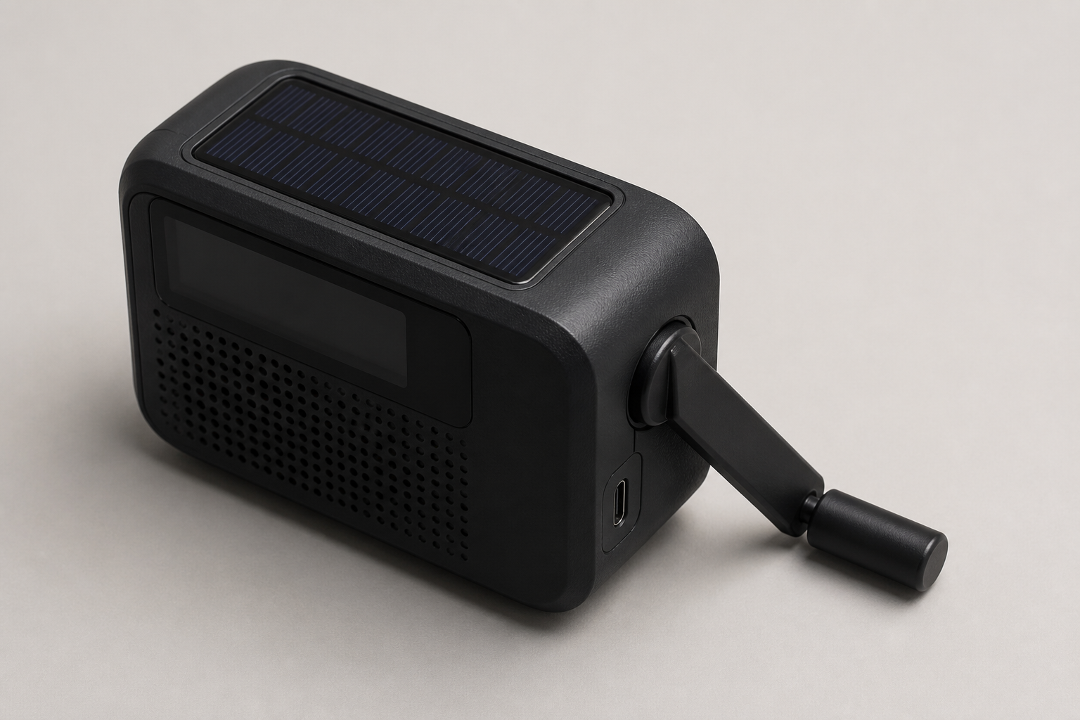Unbranded emergency radio with a top solar panel, deployed hand crank, and visible USB-C input.